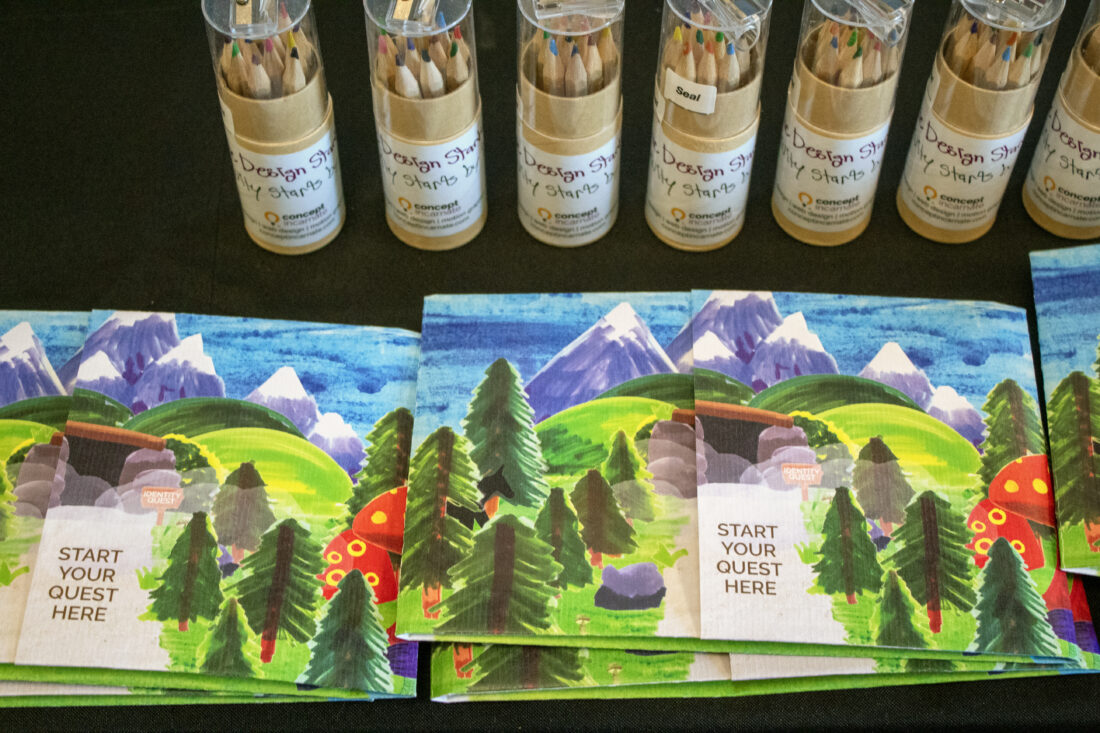 coloured pencils and a brochure